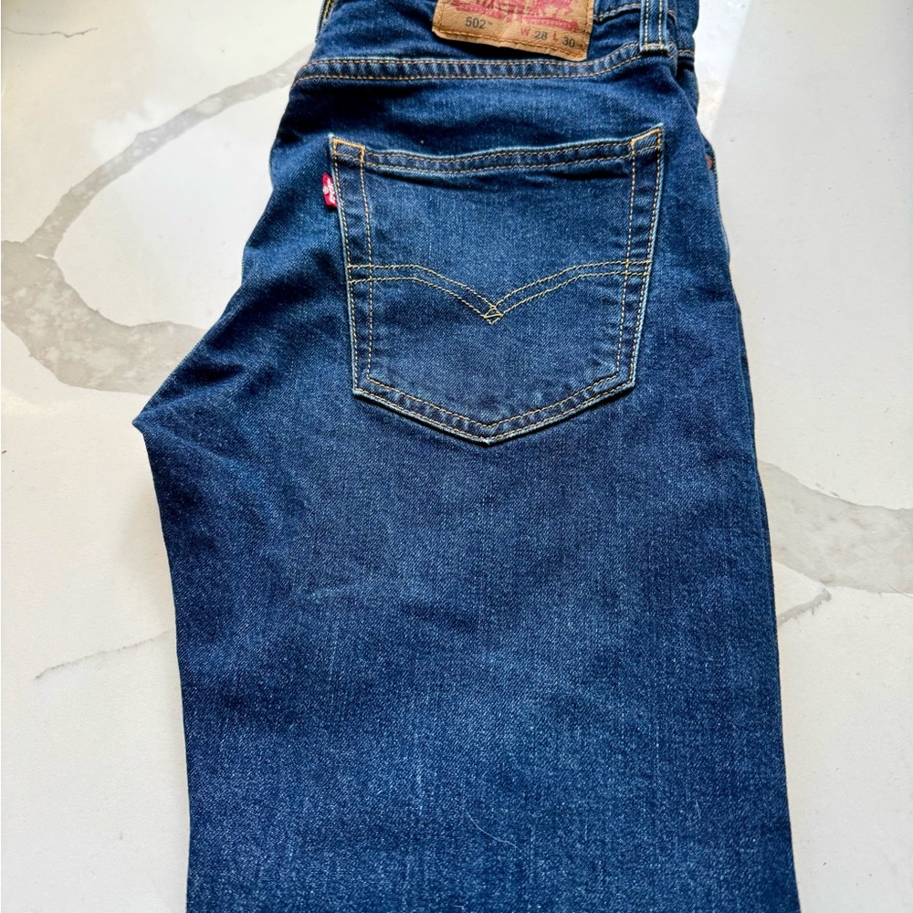 Levi's 502 taper fit jeans 28 x 30 medium-to-dark blue